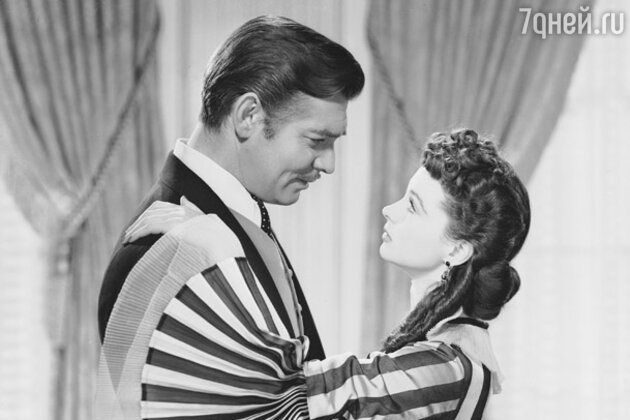 В 1939 году состоялась долгожданная премьера «Унесенных ветром». Одноименным романом Маргарет Митчелл зачитывалась вся страна, о роли Скарлетт О'Хары мечтали абсолютно все голливудские актрисы подходящего возраста. (Кларк Гейбл и Вивьен Ли - кадр из фильма.) В 1939 году состоялась долгожданная премьера «Унесенных ветром». Одноименным романом Маргарет Митчелл зачитывалась вся страна, о роли Скарлетт О'Хары мечтали абсолютно все голливудские актрисы подходящего возраста. (Кларк Гейбл и Вивьен Ли - кадр из фильма.)