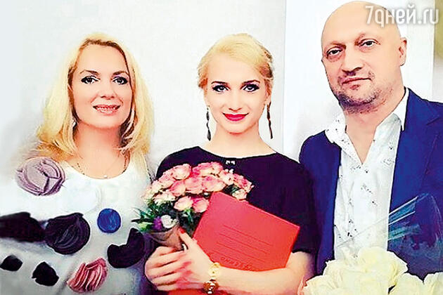 Мария Порошина и Гоша Куценко с дочерью