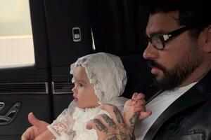 Иванова в образе невесты и серьезный Тимати: первые кадры с крещения дочки пары